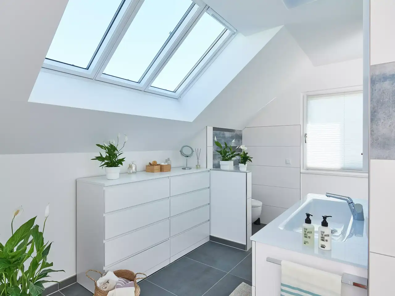 Comment installer après coup une salle de bains dans les combles